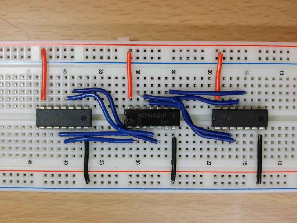 Picture of Connecting the Quad 2-input XNOR Chip to the Dual 4-input AND Chip