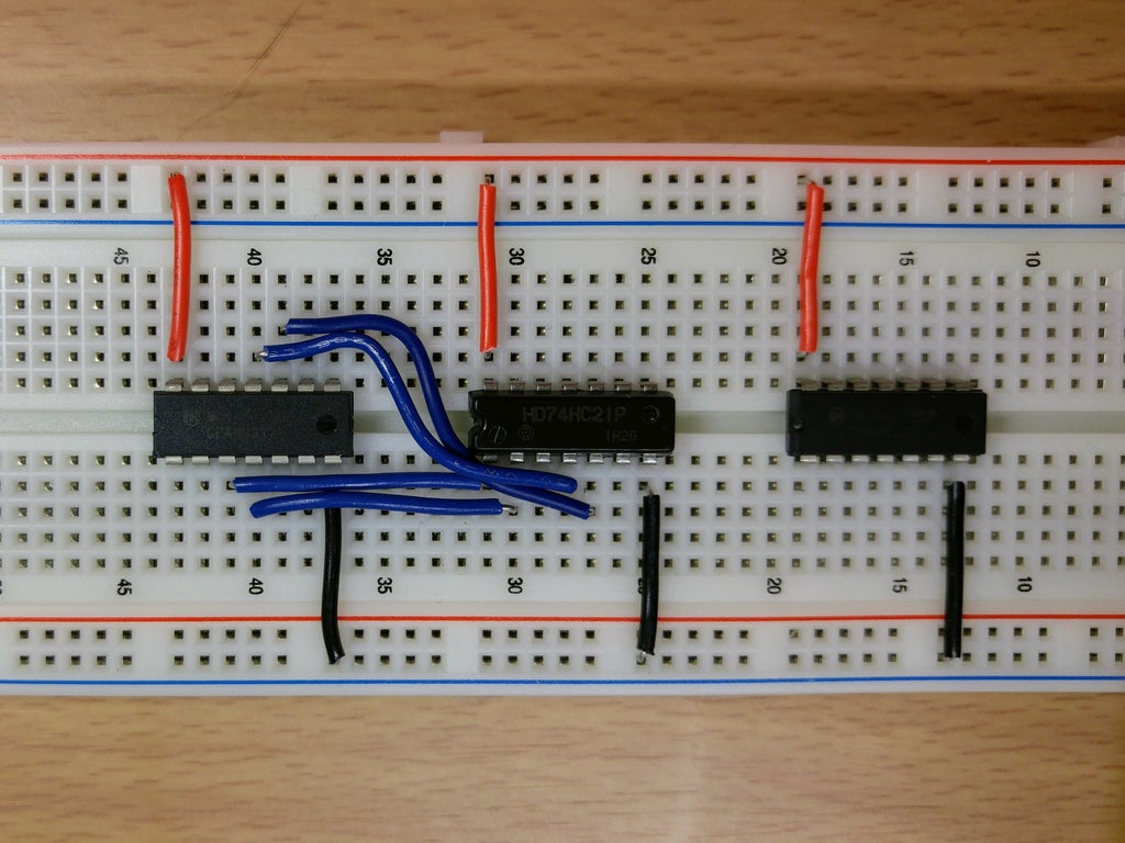 Picture of Connecting the Quad 2-input XNOR Chip to the Dual 4-input AND Chip